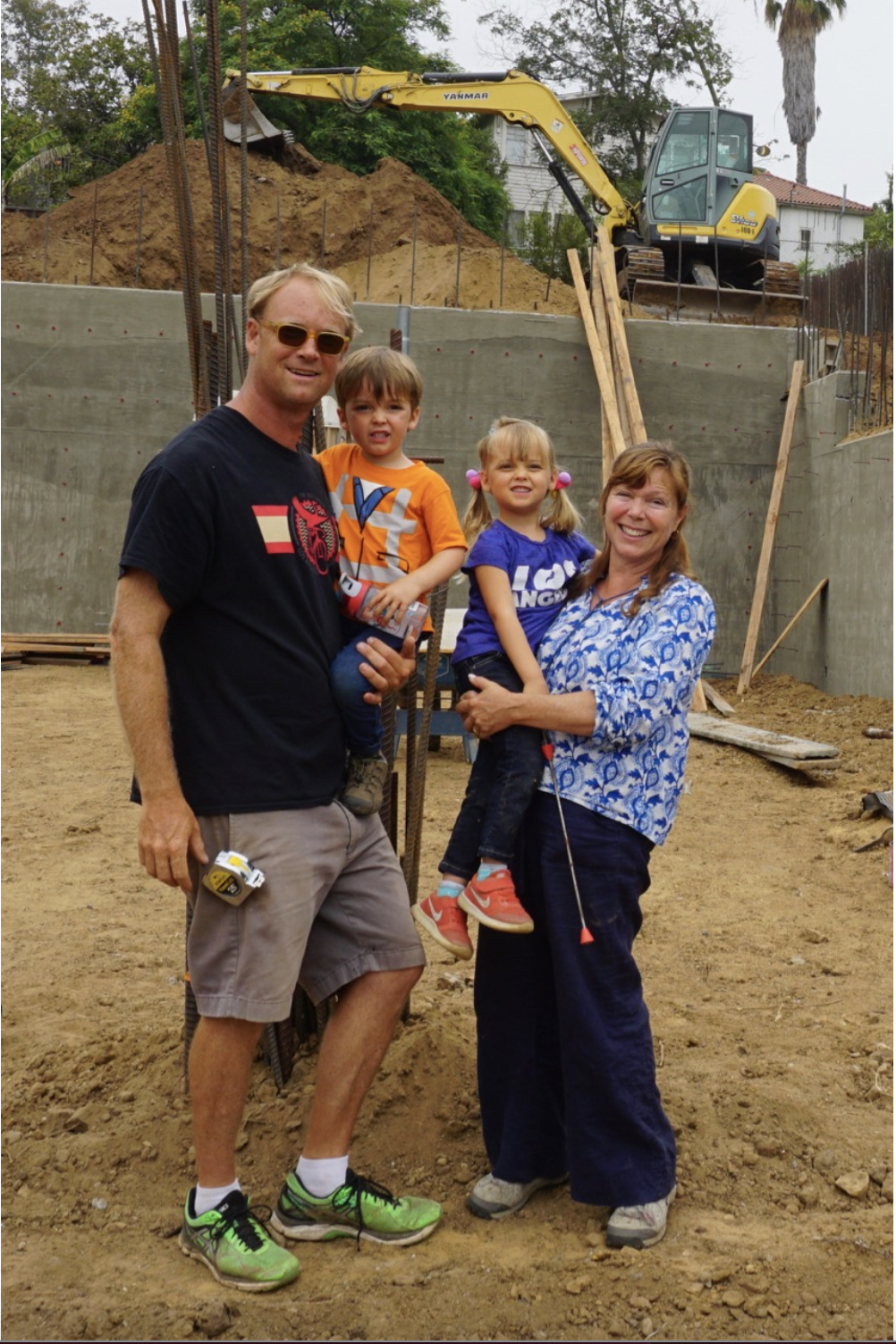 HeyDay Build family at a construction site